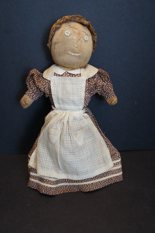 C. 1900 stockinette stump doll with brown calico dress. 14&quot;