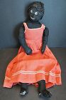 A little bit flirty black cloth doll in her favorite red dress 24"