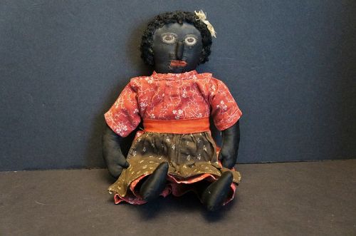 19th C. Black cloth doll with an amazing face, astrakhan hair 13"