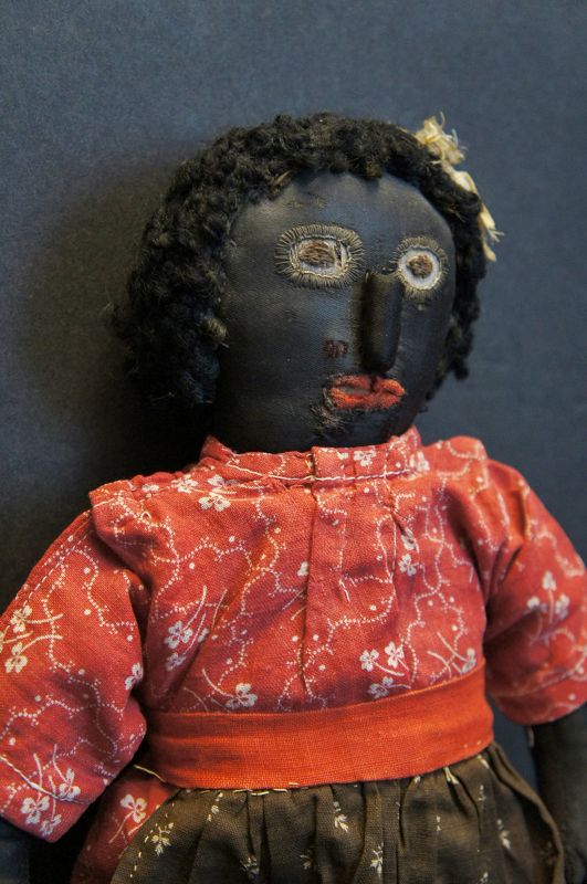 19th C. Black cloth doll with an amazing face, astrakhan hair 13&quot;