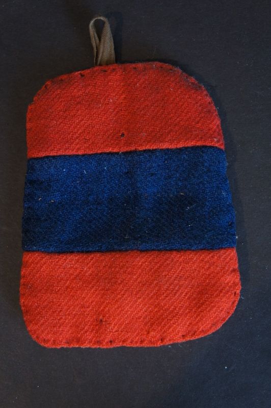 A folky red and blue homespun Pennsylvania potholder Circa 1840