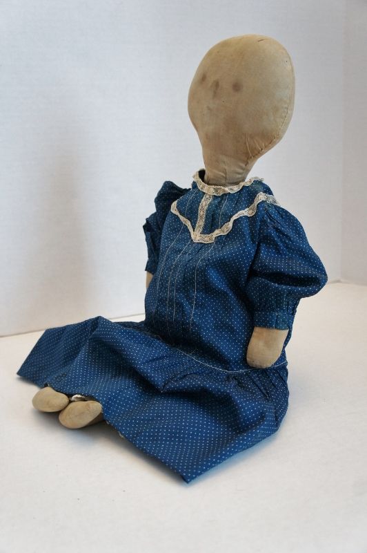 Sweet Lollipop heard doll. 20&quot; wearing a blue calico dress. C. 1890