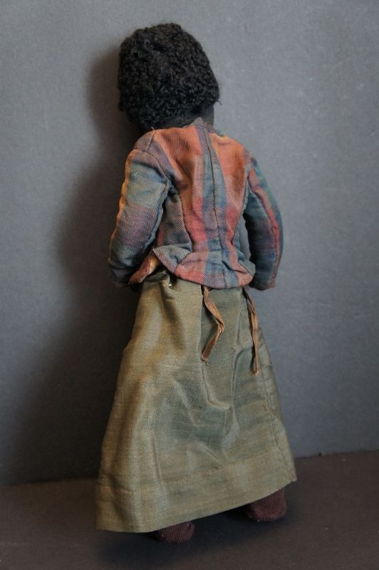 19 C. stocknette black doll, embroidered face, great clothes wire body