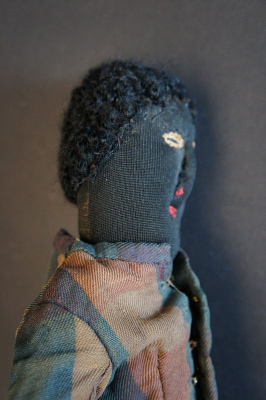 19 C. stocknette black doll, embroidered face, great clothes wire body