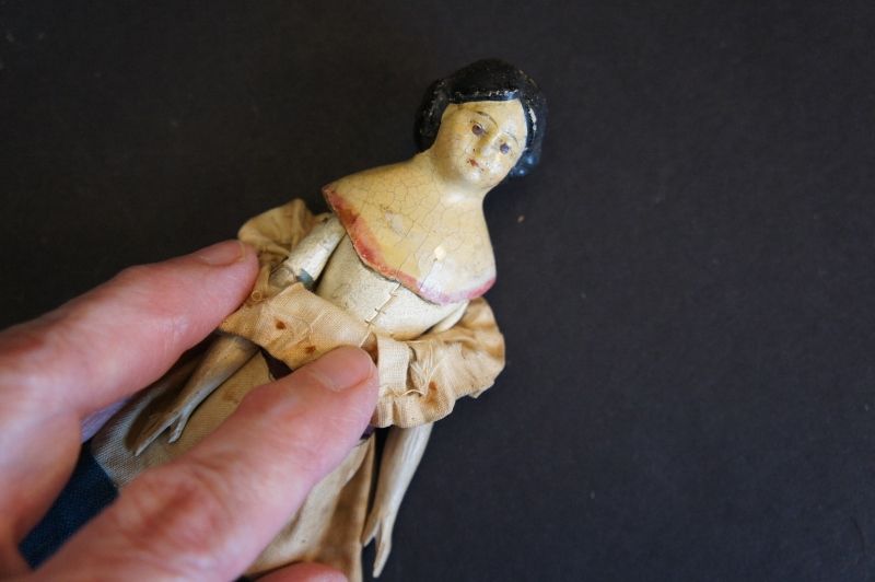 A 6 1/2&quot; milliner's model doll with origina clothes C.1860