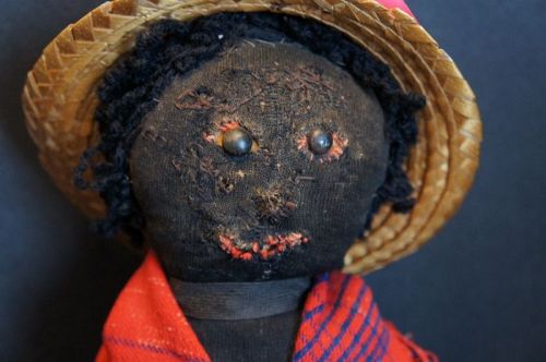 Before plastic surgery,a sweet smiling black doll 14" hand sewn C 1880