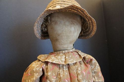 22"  lovely lady with a straw hat and brown calico dress C.1890