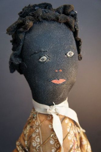 An amazing black doll, all original clothes, great face and hair  21"