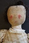 Rosy cheeks, bright blue eyes, linen doll is from the 1870-80