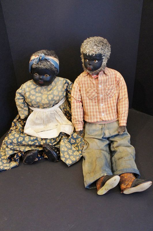 Pair of composition black dolls great faces, great clothes