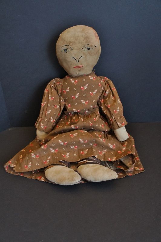 Old, antique, embroidered face, brown calico dress...doll 23&quot; 1890