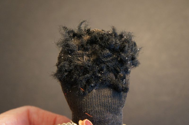 Tiny, cute, old, 9&quot;, C.1920 black stockinette doll