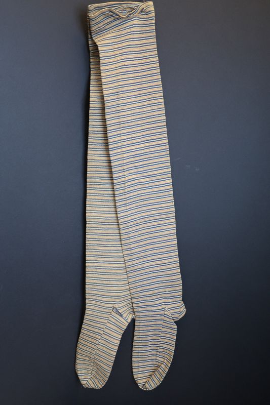 Mustard, blue and white woman's pair of 19th C. knitted socks 28&quot;