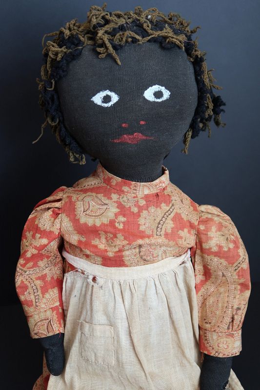 A shelf sitter, Big beautiful painted face black doll 1890  24&quot;