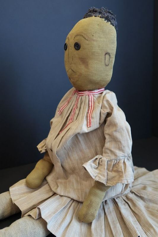 A thinker, not a doer,  28&quot;  black cloth doll 1890-1900