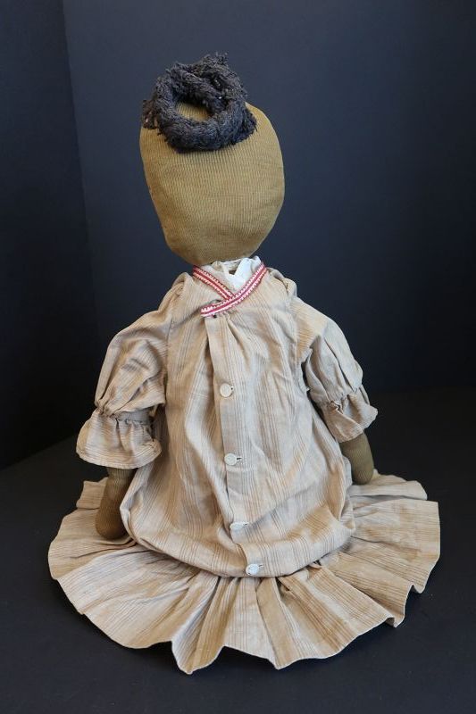 A thinker, not a doer,  28&quot;  black cloth doll 1890-1900