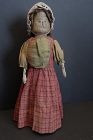 C1820 wooden bedpost doll with carved features 13"