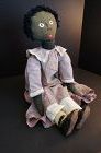 First grade here I come. Black cloth doll 27" tall C.1900