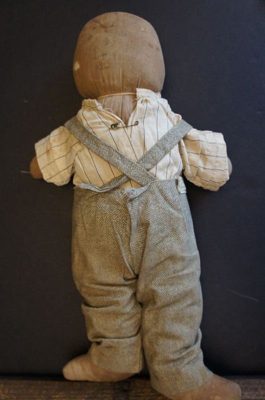 A little fellow, plump and sturdy with his favorite overalls 14&quot;