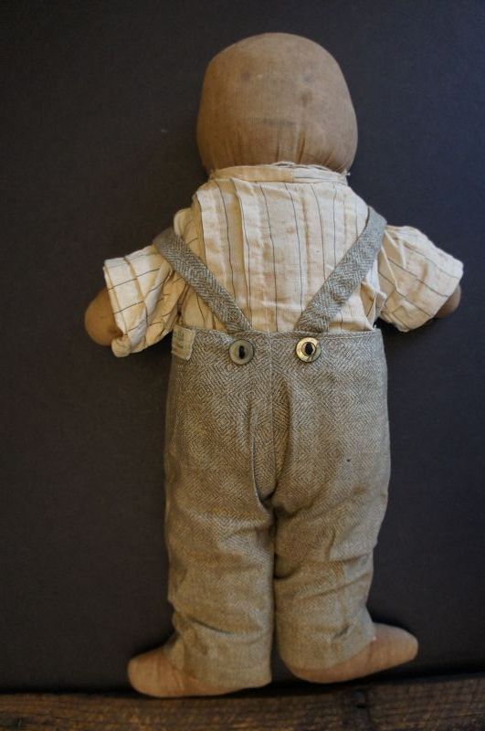 A little fellow, plump and sturdy with his favorite overalls 14&quot;