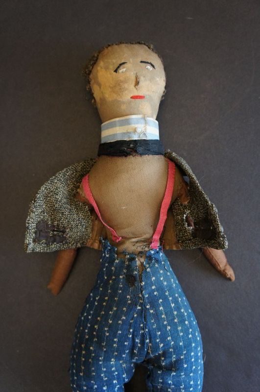 The shirt off my back, black cloth doll embroidered face. C.1870 14&quot;