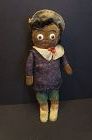 Who am I, great little black doll , velvet face and over wood?10"