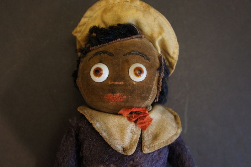 Who am I, great little black doll , velvet face and over wood?10&quot;