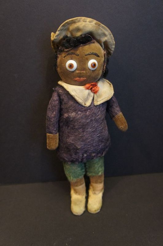 Who am I, great little black doll , velvet face and over wood?10&quot;