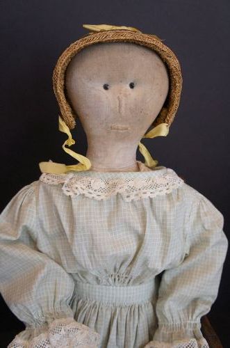 A 25" cloth doll that would be great at playing poker,1870-80