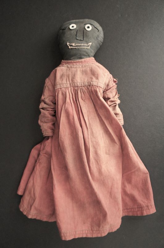 Seen a lot of happy years, black cloth doll /great old red dress C1890