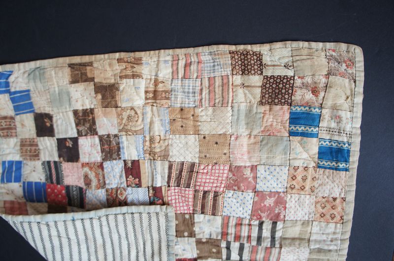 Postage stamp doll quilt with some wonderful brown calico fabric C1880