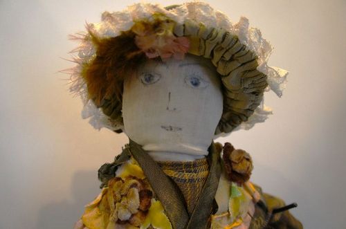 A wonderful little rag stuffed doll all dressed up . 14" & C.1880