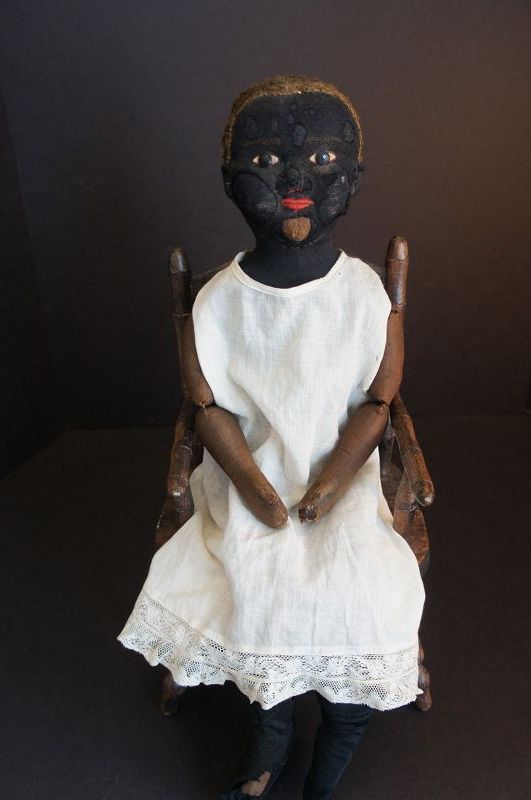 Left  behind, tired and worn black doll doll Beecher type Circa 1900