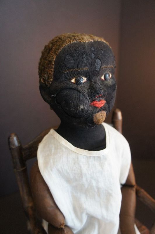 Left  behind, tired and worn black doll doll Beecher type Circa 1900