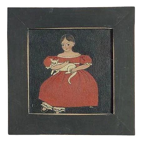 Sandy Laughlin folk art style oil painting of a young girl with a red dress holding her cat