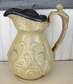 Buff Colored Relief Molded Stoneware Wine Jug, c. 1830