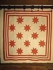 12 star pieced cotton quilt American late 19th century