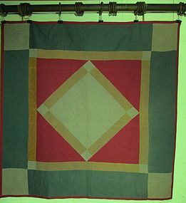 An Amish pieced Diamond in Square quilt dated 1916