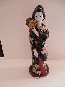 Kutani porcelain Bijin with a drum Meiji c. 1890
