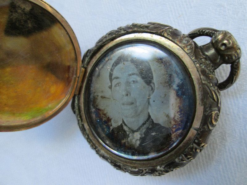 Double daguerreotype locket 1850’s husband and wife