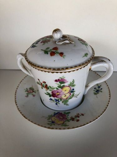 French floral decorated porcelain trembleuse cup with lid circa 1780