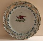 Porcelain plate with painted bird Chelsea gold anchor circa 1765