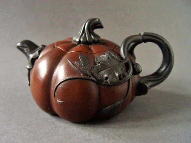 A lovely marked Yixing Pumpkin shape Teapot