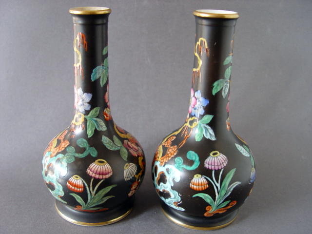 A nice pair of late Qing Famille Noire vases