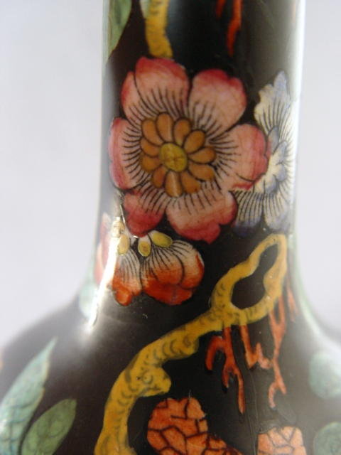 A nice pair of late Qing Famille Noire vases