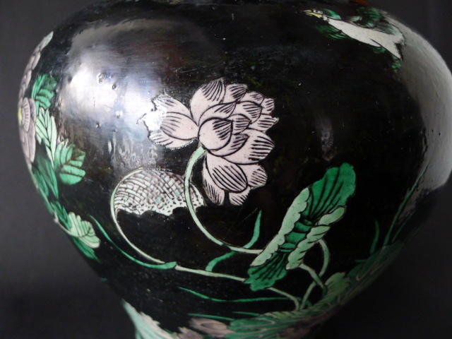 A richly decorated 19th cent. Famille Noire Peacock jar