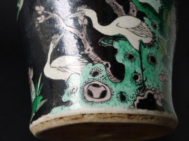 A richly decorated 19th cent. Famille Noire Peacock jar