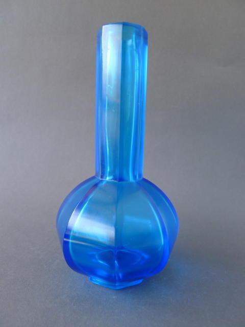 An Qianlong octagonal facetted blue glass bottle vase