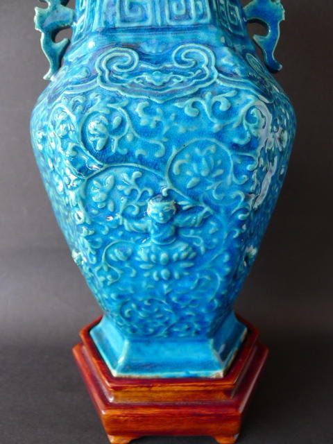A moulded Kangxi turquoise glazed  ten boys vase