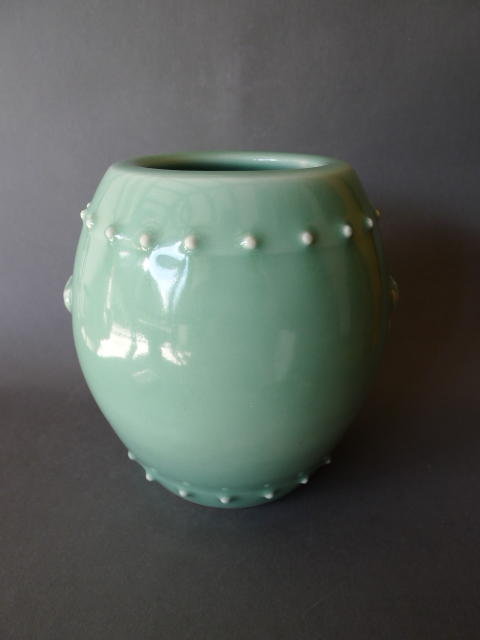 A Celadon glazed Barrel-shaped vase